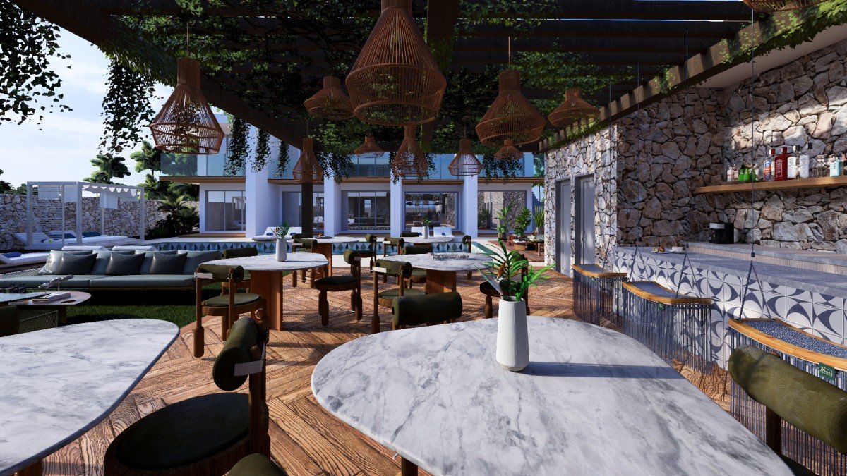 Bar-lounge bajo pérgola de Takuma Smart Hotel
