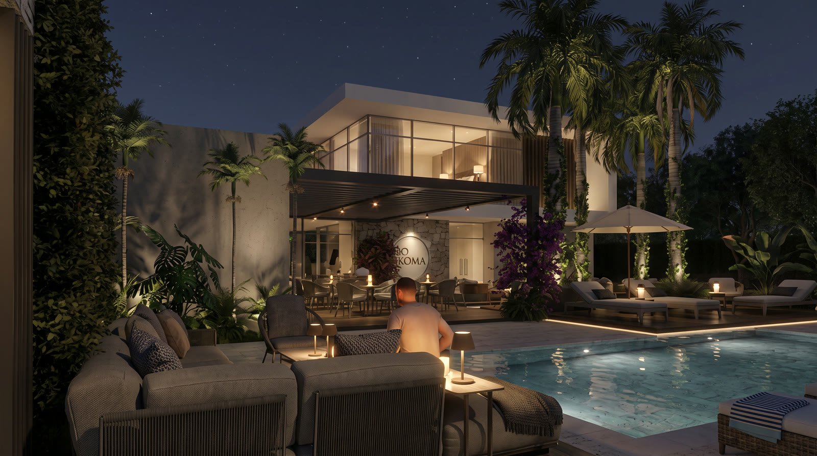 Lounge nocturno junto a la piscina de Takuma Smart Hotel