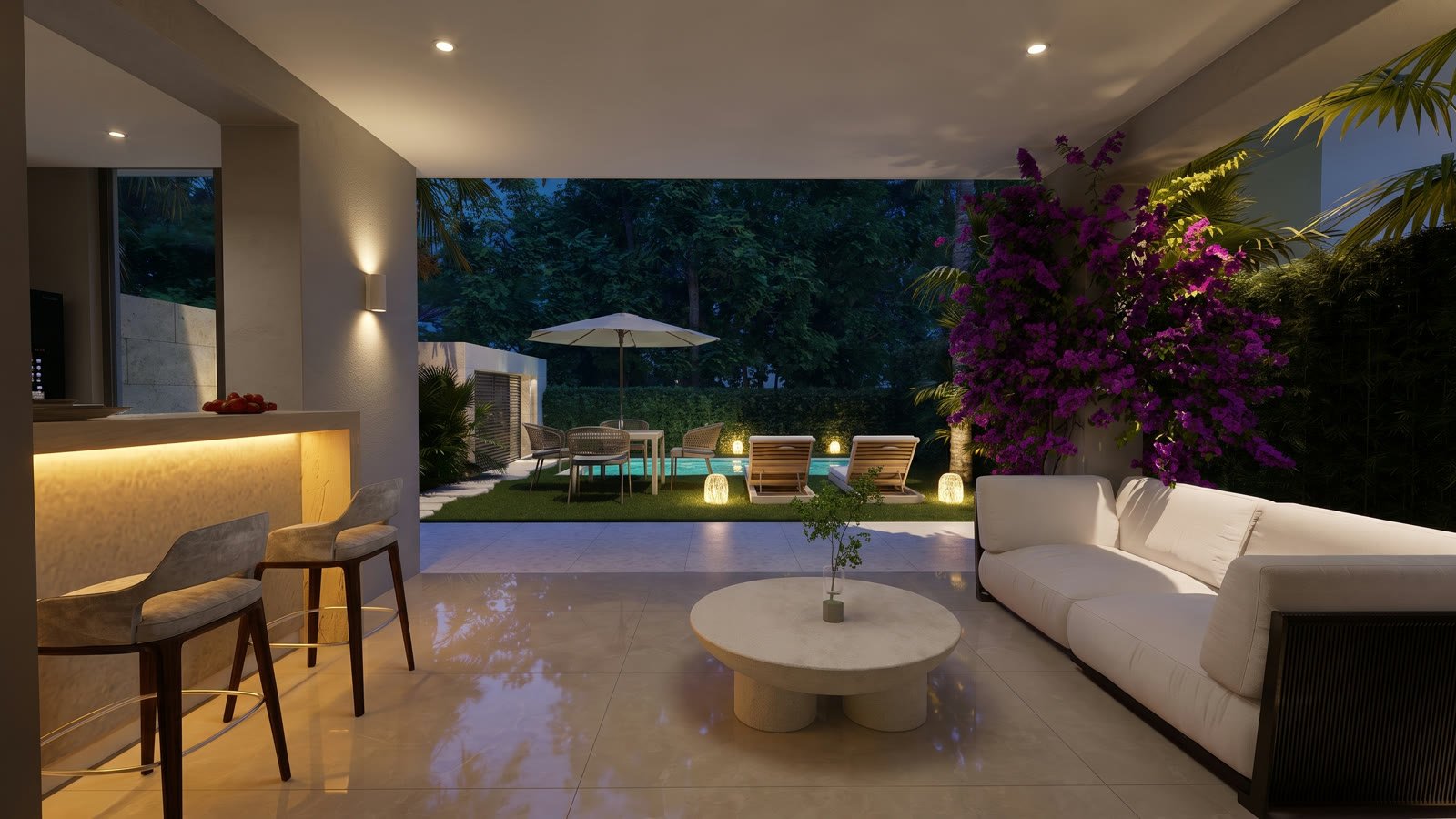 Lounge interior de Takuma Luxury Villas con vista al jardín
