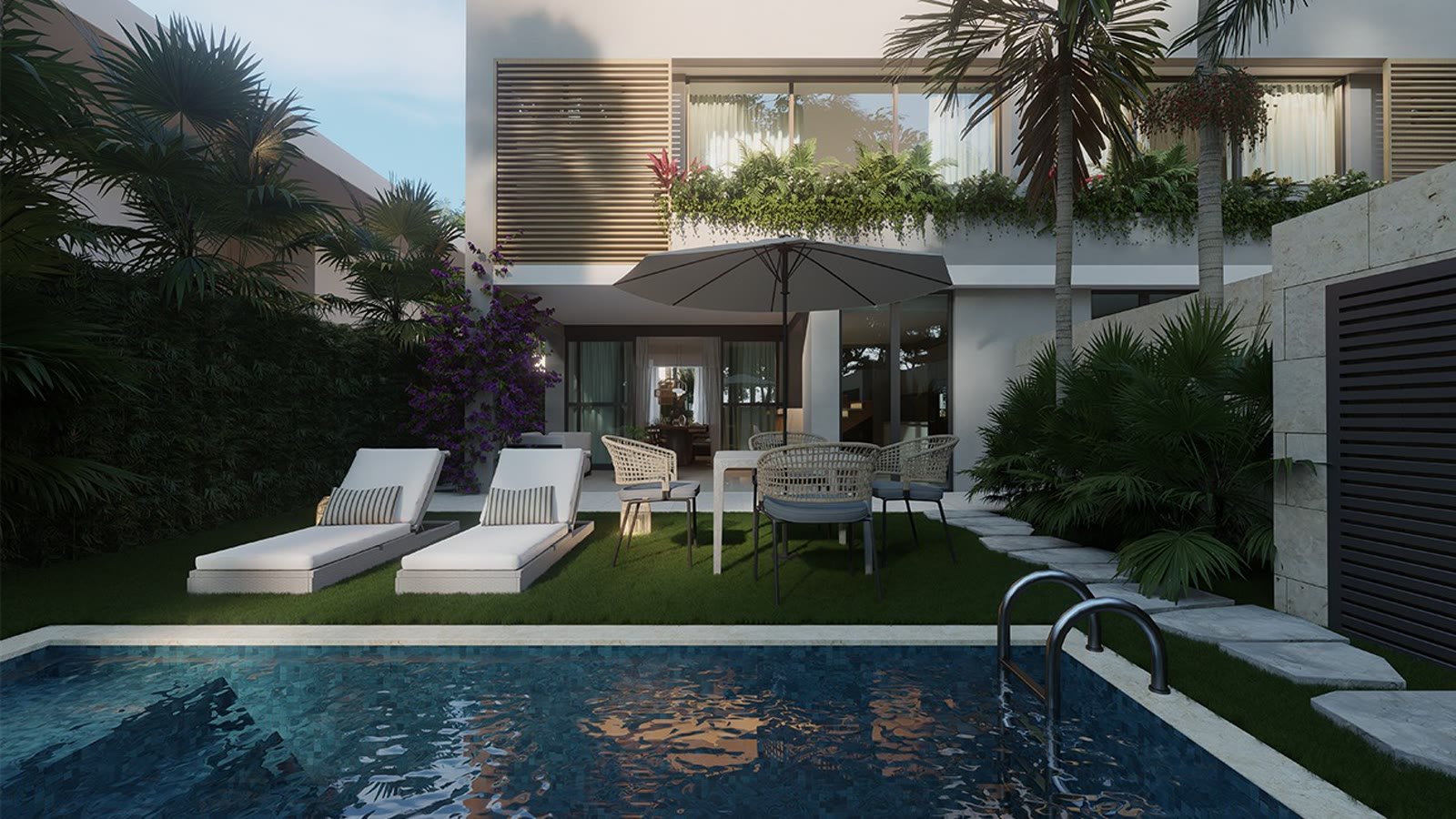 Piscina privada de Takuma Luxury Villas al anochecer